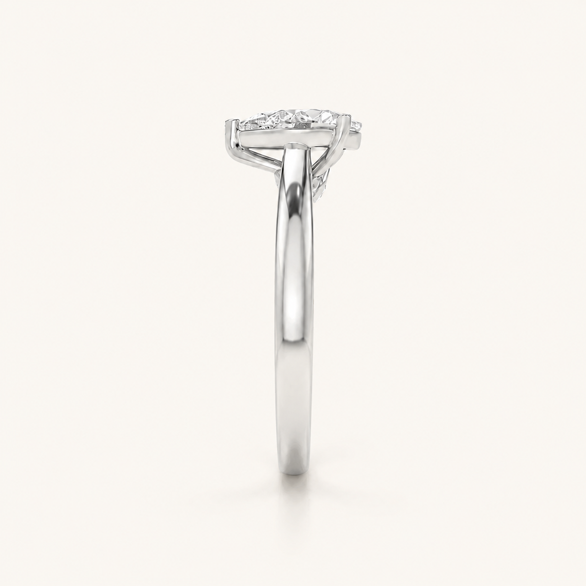 1.25 CT Pear Cut Lab Grown Diamond Side Stone Ring