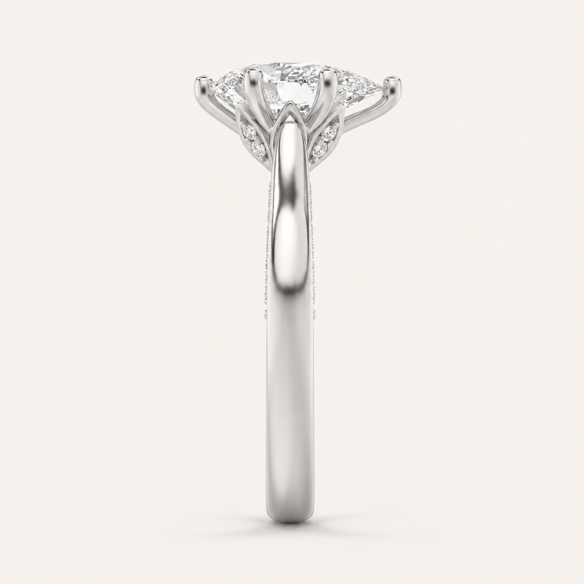 1.25 CT Pear Cut Lab Grown Diamond Side Stone Ring