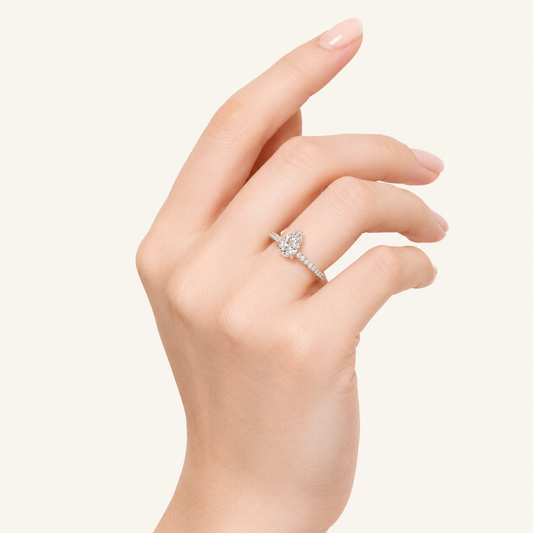 1.25CT Pear Cut Lab Grown Diamond Side Stone Ring