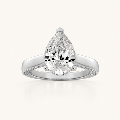 1.25 CT Pear Cut Lab Grown Diamond Side Stone Ring
