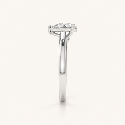 1.25 CT Pear Cut Lab Grown Diamond Side Stone Ring