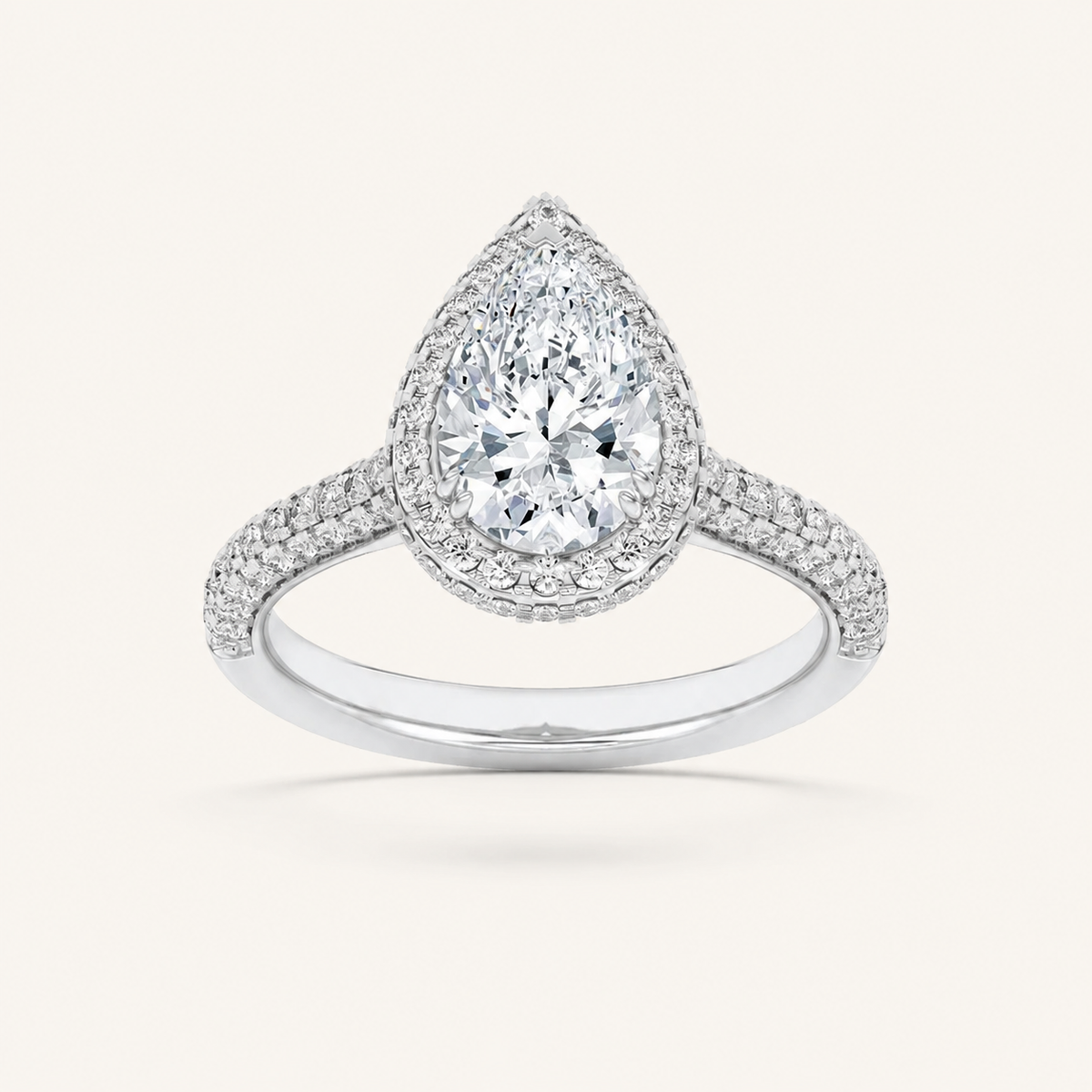 3CT Pear Cut Lab Grown Diamond Halo Side Stone Ring