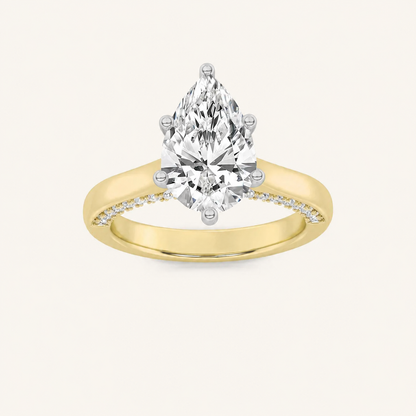 1.25 CT Pear Cut Lab Grown Diamond Side Stone Ring