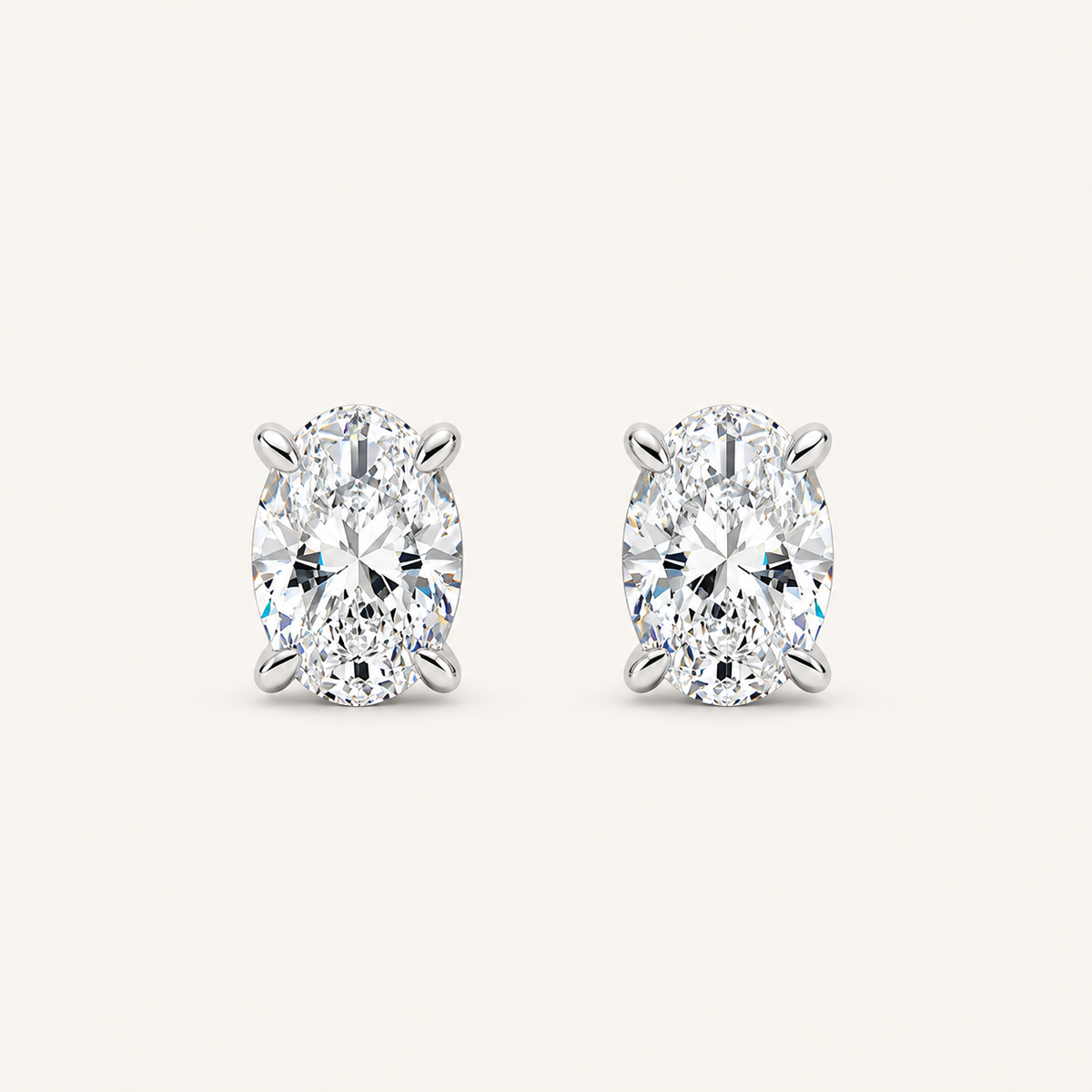 2CT Oval Cut Lab Grown Diamond Four Prong Stud Earrings