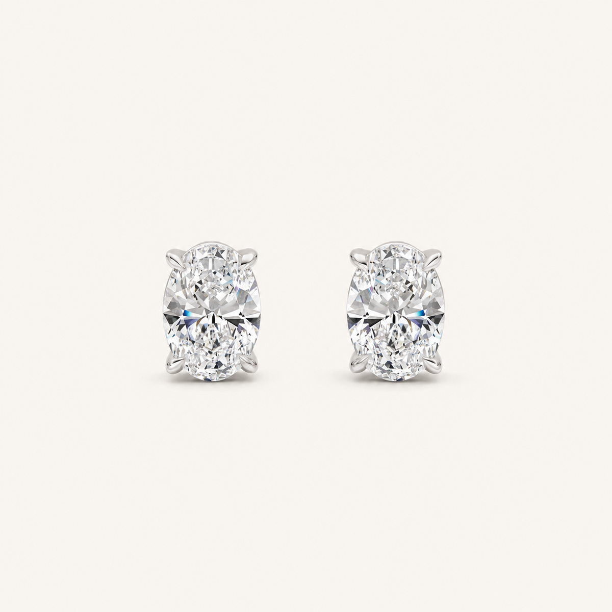 1CT Oval Cut Lab Grown Diamond Four Prong Stud Earrings